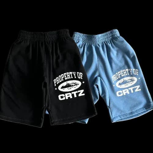 corteiz shorts property black -baby blue