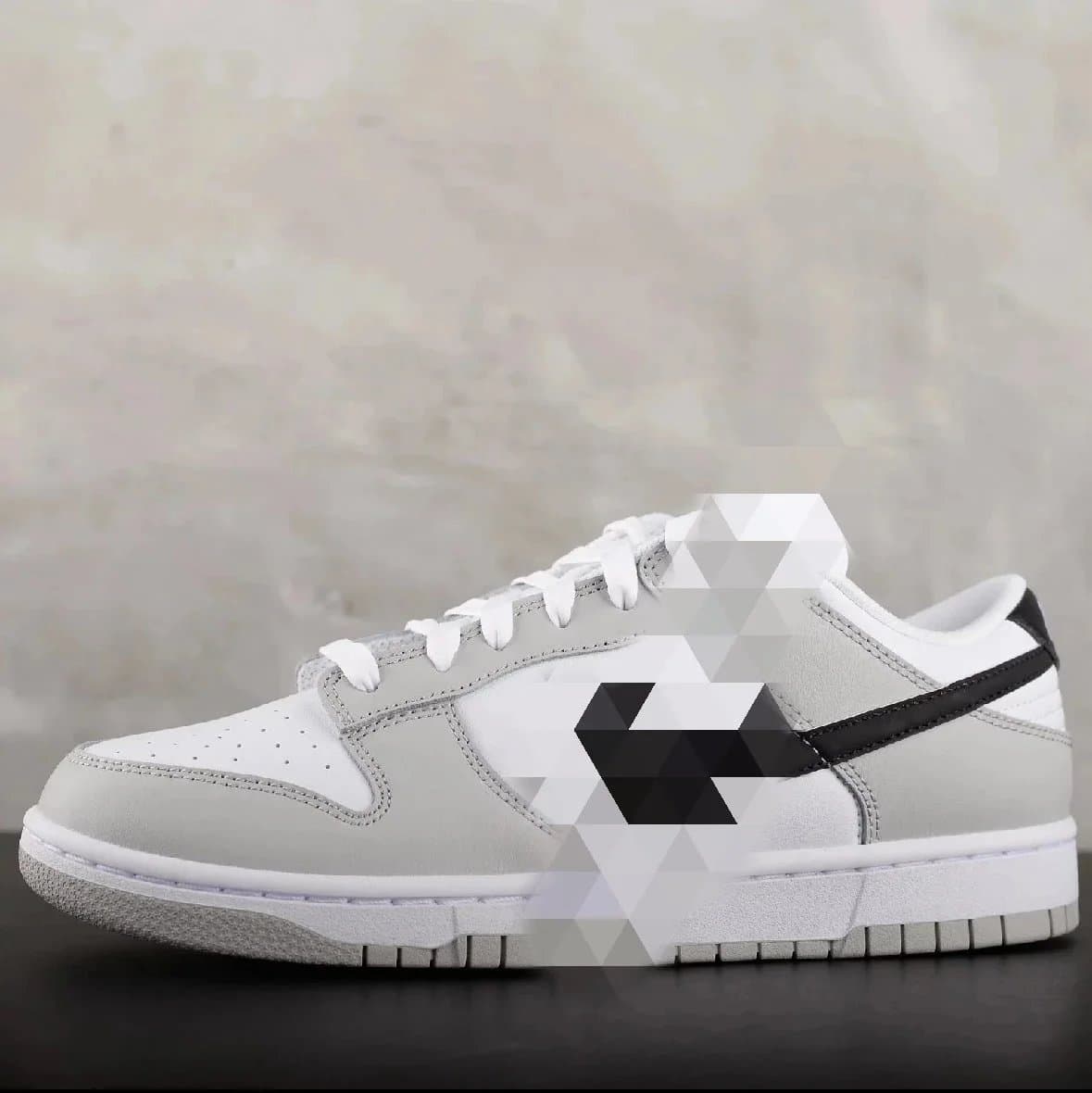 Nike SB Dunk Low gray and black lottery M