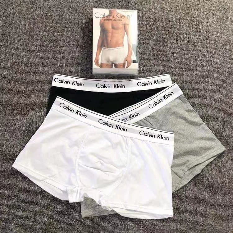 Men's summer pure cotton boxer briefs youth boxer briefs boys antibacterial simple mid-waist solid color 21.9 yuan